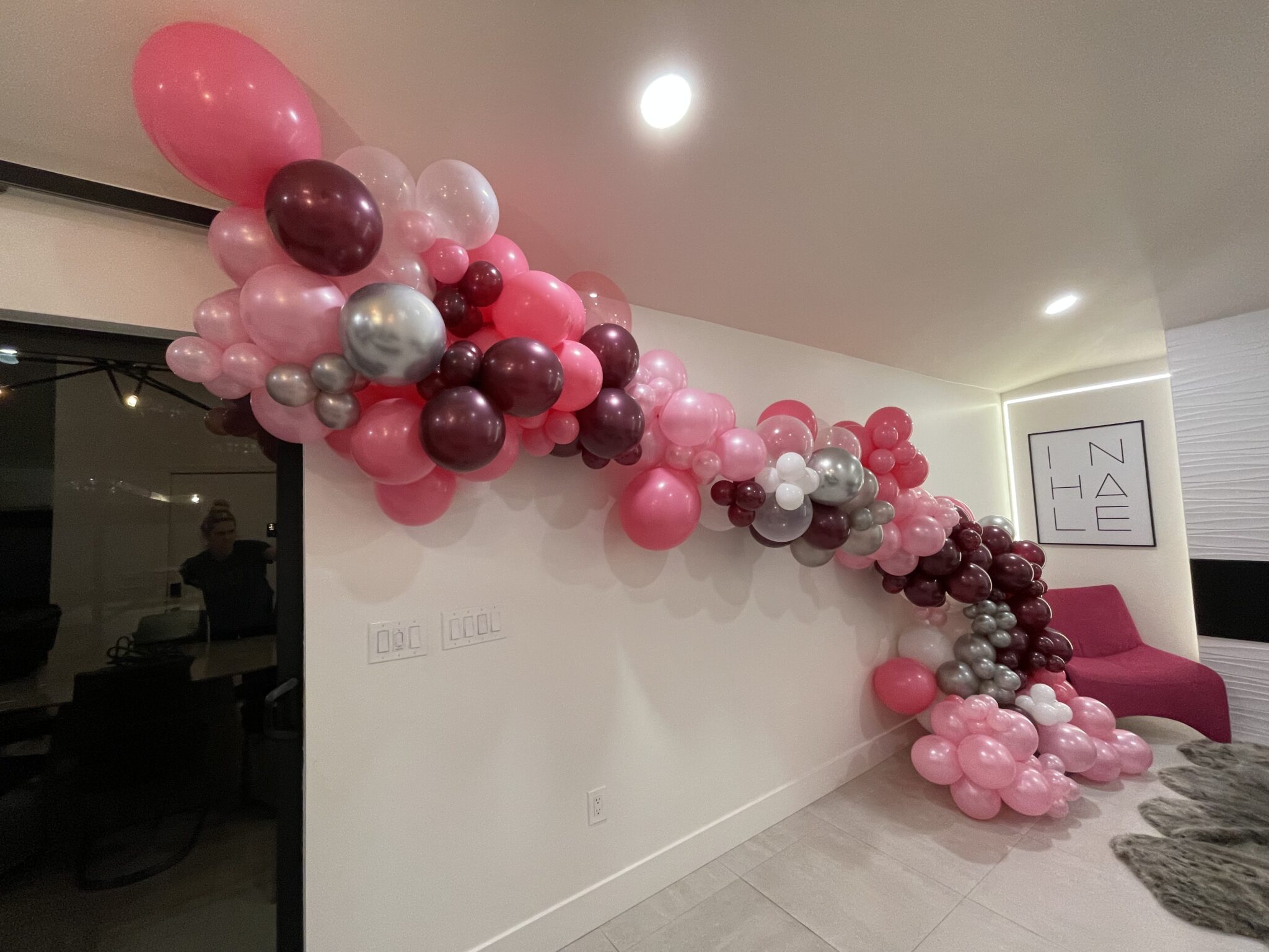 Party styling detail with balloons and signage