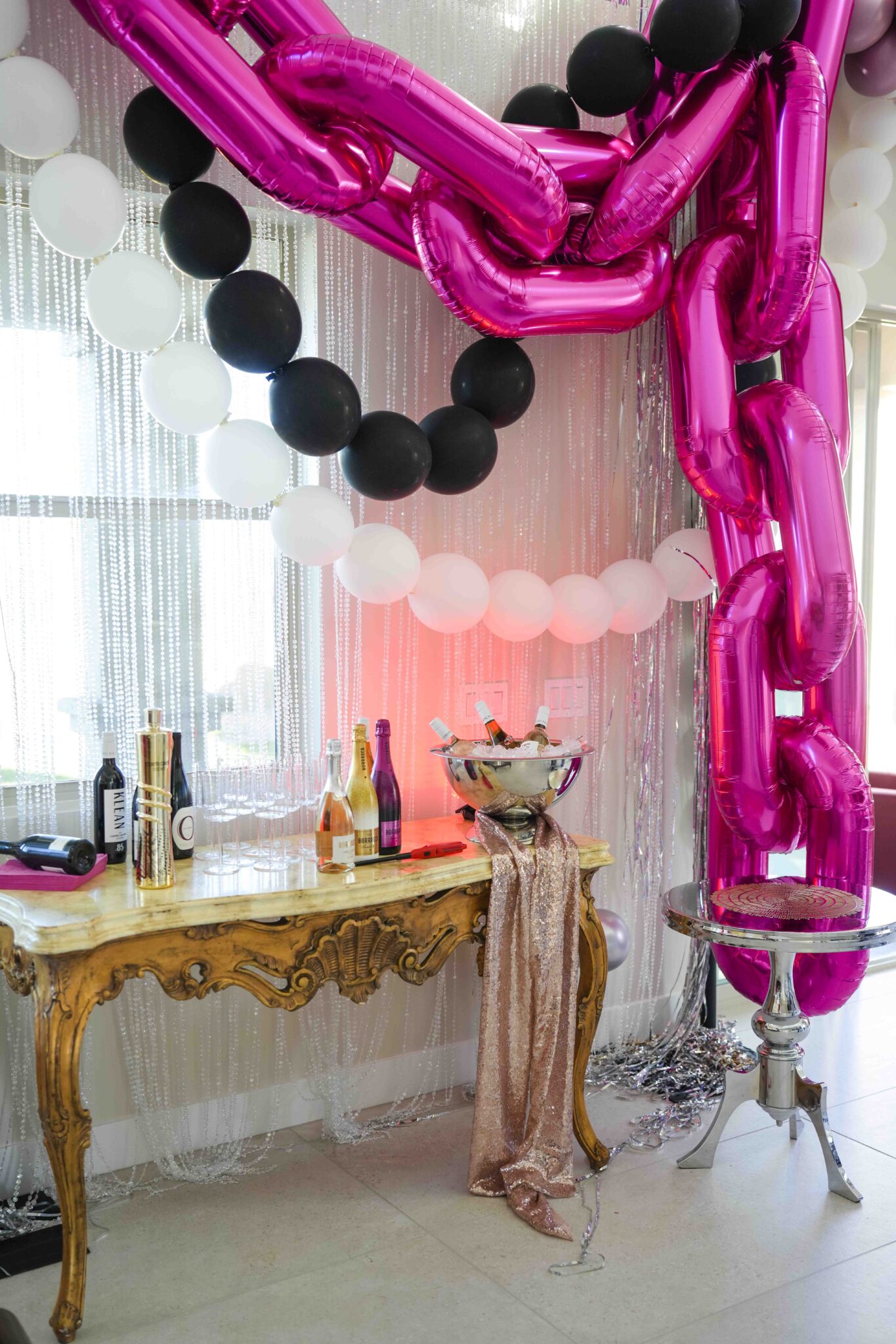 Party decor detail with florals and balloons