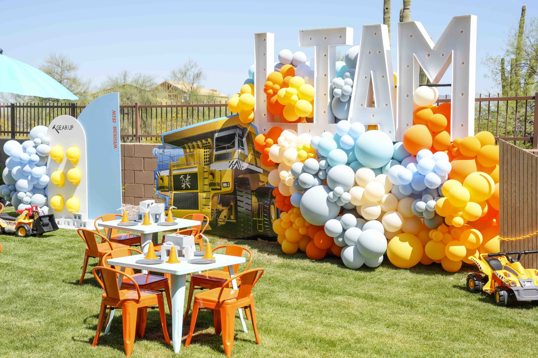 Baby shower styling with balloon backdrop