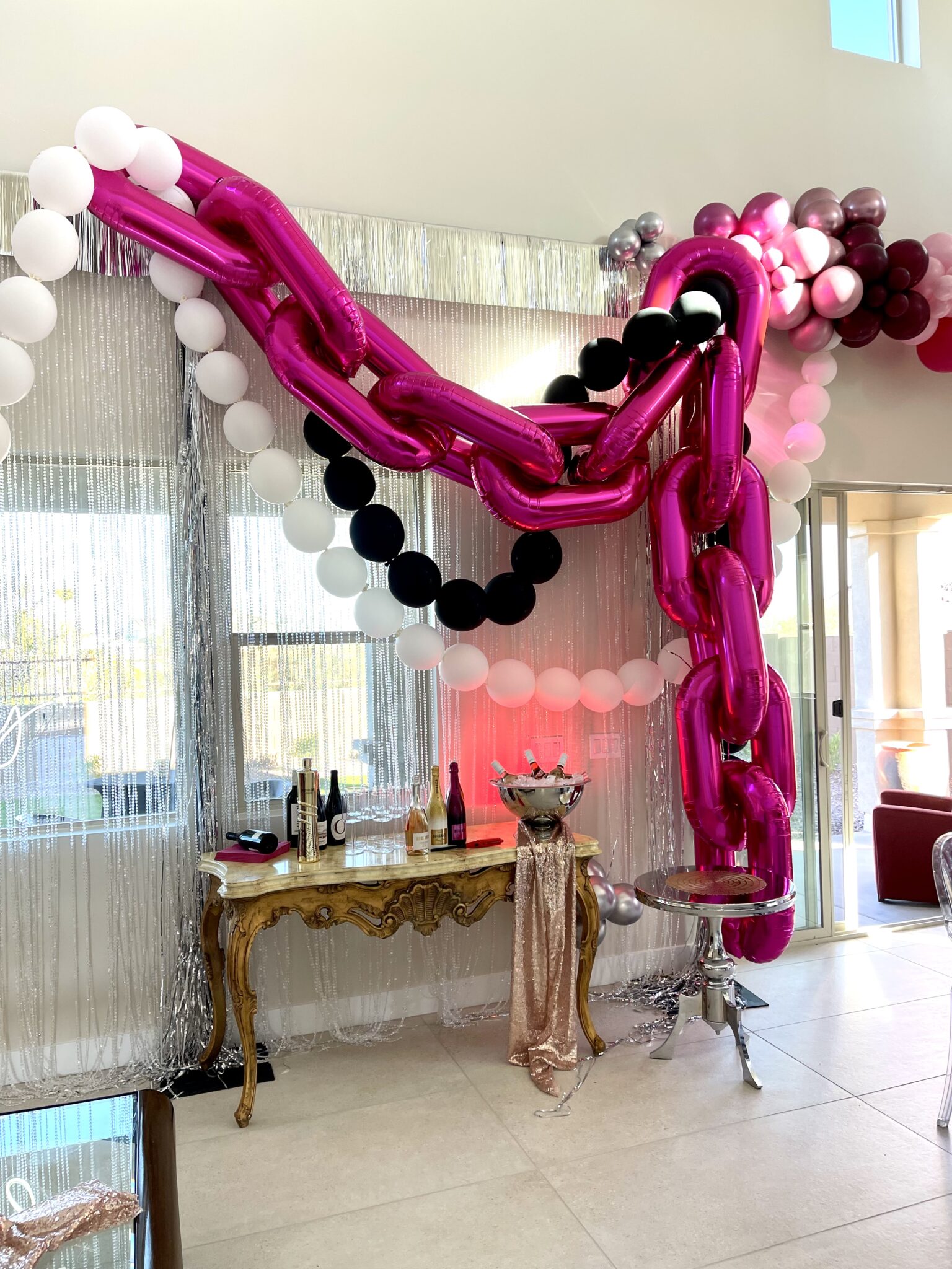 Balloon garland in jewel tones for an evening party
